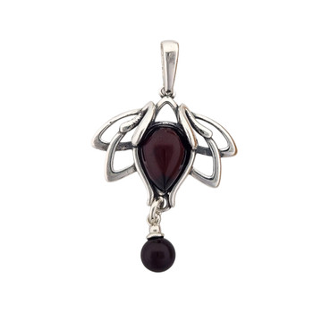 Cherry Amber sterling silver Lotus pendant.  Cherry Amber sterling silver Lotus pendant.