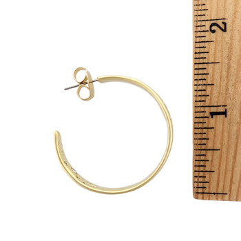 14kt. gold plated hoop earrings with CZ detail with a ruler.  14kt. gold plated hoop earrings with CZ detail with a ruler.