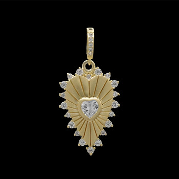 Gold Heart Pendant with CZ Stones with a black background. Gold Heart Pendant with CZ Stones with a black background.