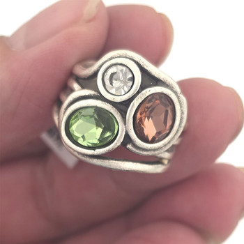 Swarovski crystal silver-plated statement ring in my hand. 