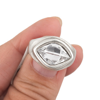 Clear crystal silver-plated adjustable ring in my hand. 
