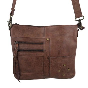 Brown leather Myra Bag Stratton Peak crossbody purse close-up. 