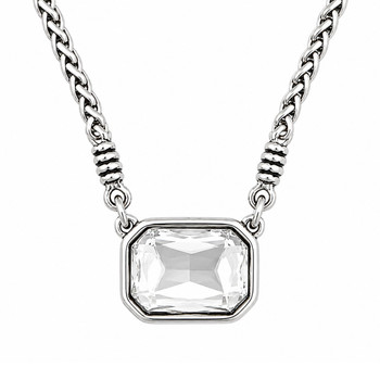 Large, clear, rectangular crystal and silver-plated chain necklace close-up. 