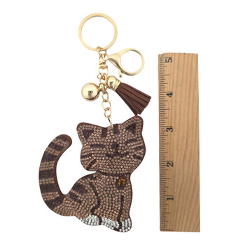 Brown rhinestone kitty cat keychain with a ruler. 