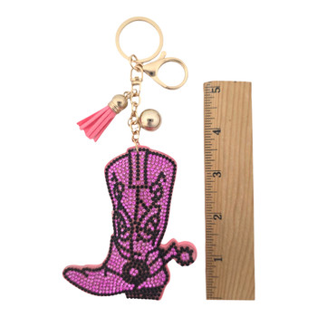 Pink and black rhinestone cowboy boot keychain with a ruler. 