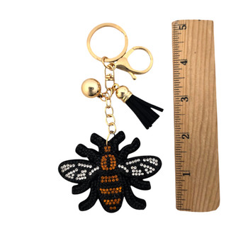 Bumblebee rhinestone keychain with a ruler.