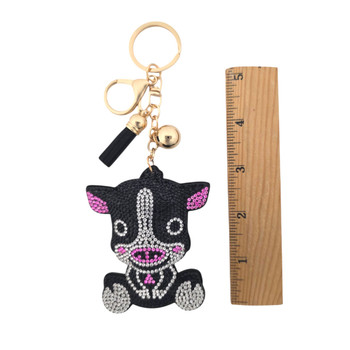 Cow rhinestone keychain with a ruler. 