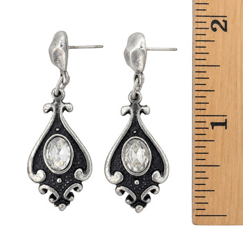 Clear quartz post dangle earrings with a ruler. 