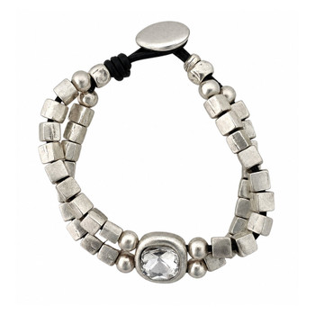 Double-strand square bead bracelet on leather cord with a clear crystal centerpiece and toggle closure.
