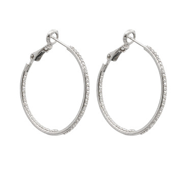Rhodium-plated Cubic Zirconia hoop earrings. 