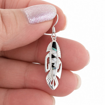 Sterling Silver White Buffalo Onyx Opal Feather Earrings in my hand