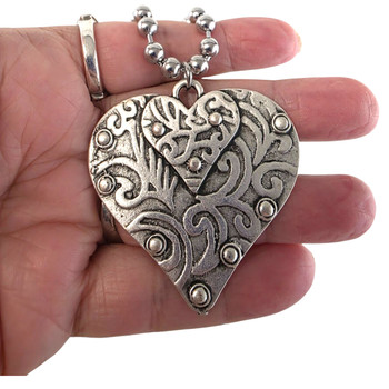 Double Heart Embossed Statement Pendant Detail