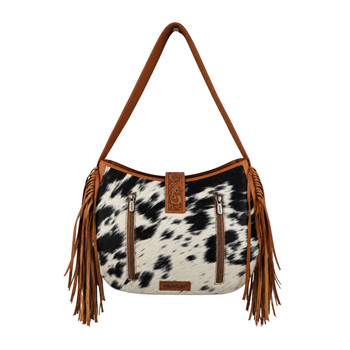 Back view of Myra Bag Loyal West Desert Trail Medium Shoulder Bag featuring genuine black and white hair-on calfskin, two vertical zippered pockets, brown leather trim, floral tooled leather accents, and long side fringe.