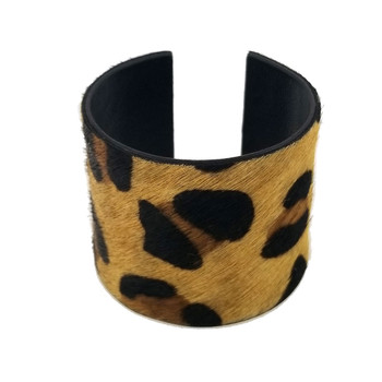 Tan leopard print cowhide cuff bracelet. 