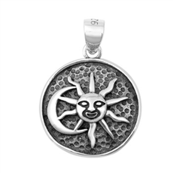 Sun and moon sterling silver pendant.  Sun and moon sterling silver pendant.