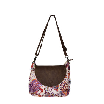 Floral leather and cotton crossbody purse. 
