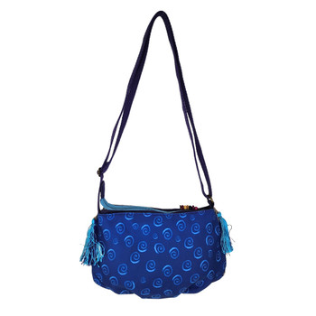 Backside of blue cat Laurel Burch purse. 