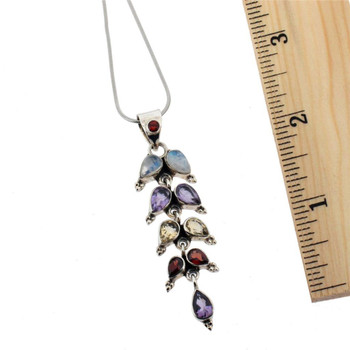 Multi stone sterling silver pendant.