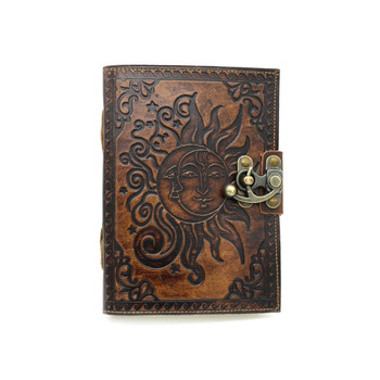 Celestial embossed sun and moon leather journal. 