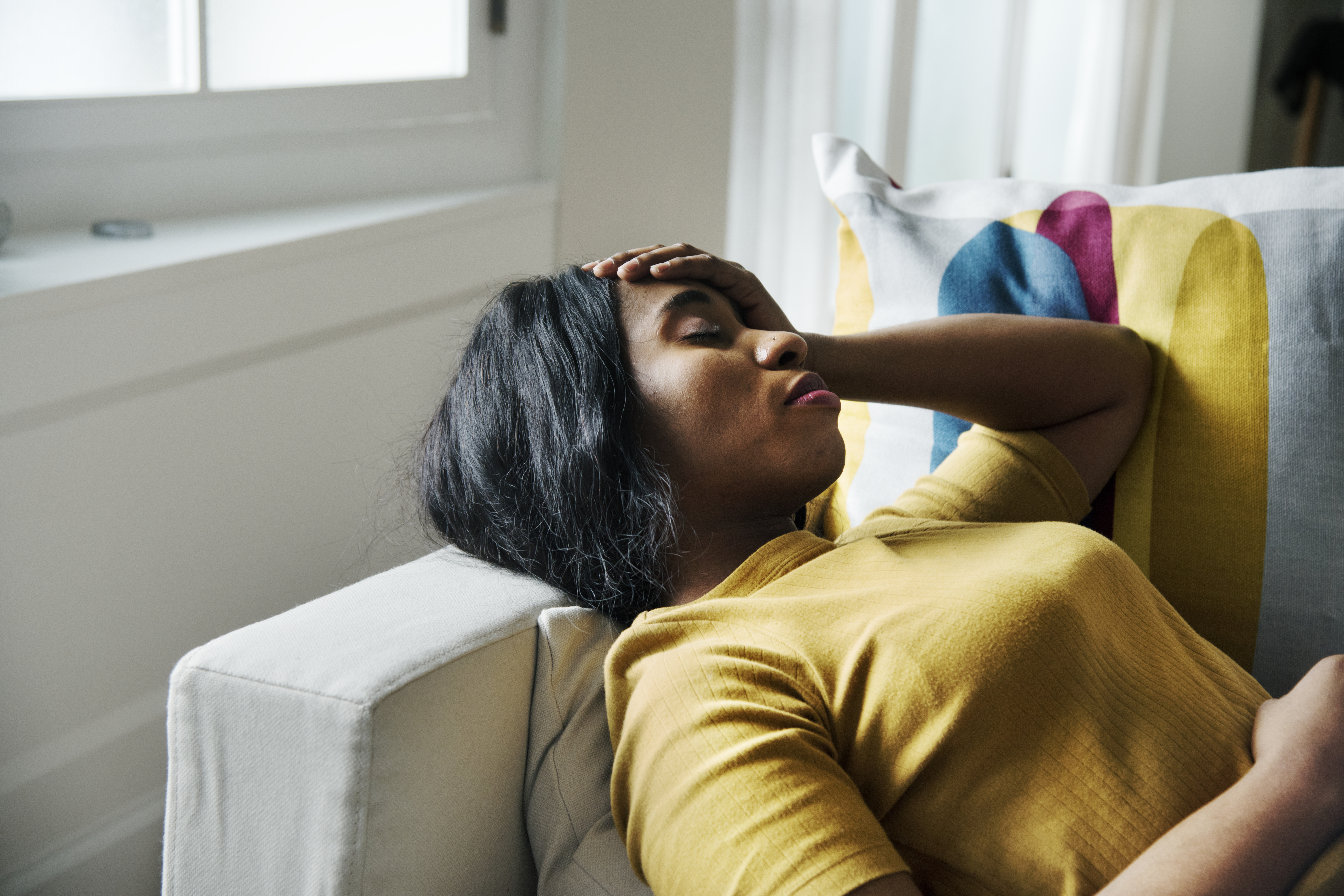 black-woman-headache-sleeping.jpg