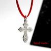 Sterling Silver Orthodox Baptism Cross. An elegant tiny silver cross is just perfect for a newborn. Elegant engraved design has the initials for Jesus Christ "ИС ХС" and a descending dove representing the Holy Spirit. A prayer in Russian on the back reads Спаси и Сохрани (Save and Protect). ½" (12mm). Sterling silver, cast by hand in small batches using the lost wax method. Elegantly gift boxed.
