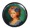 Young Maid of Honor (Фрейлина). A pretty young woman gazes at the viewer. The fraulein is a maid of honor or a junior attendant to the court. She wears a blue dress with a matching ruffle collar and a striking single blue flower in her hair. Bright silver border decoration Materials used are oil paints, papier-mache, metallic powders and lacquer. Marked "Федоскино" (Fedoskino) with a visible, but illegible, signature of the artist. Attached with classic safety pin embedded into the back.