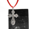 St. Olga Sterling Silver Russian Orthodox Cross. Traditional raised design: the initials for Jesus Christ, IC XC, and a descending dove. With the short prayer on the back: "Спаси и Сохрани" (Save and Protect). 1" (25mm) Sterling silver, hand cast in small quantities using the lost wax method. Patina means a slight darkening in order to bring out detail.
