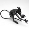 Chyort (Devil). Double-handed mocking "thumbing nose" pose. Cast iron (Dutch soot). Shiny black finish. Made in Kasli circa 1970-1980.