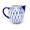 Cobalt Net Small Milk or Cream Pitcher. Elegant small pitcher from the Lomonosov Porcelain Factory in St. Petersburg, Russia. Makes a terrific gift! Fully hand painted and decorated. Not a Chinese knock-off!  Mineral cobalt, 22Kt gold. 3" height, 3¾" width, 6oz. capacity.