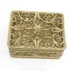 Golden Filigree Box. This elegant box was made entirely by hand, and not by a machine. It is a fine example of design and craftsmanship that was perfected in the days of Empress Catherine the Great (1762-1796). The pattern is reminiscent of bobbin-lace, and the artisans who created this style named it "Dew Drop" (in Russian, "Росинка"). It is hand decorated with tiny round pellets called "seed pearls" ("семенные жемчужины") and capped with a hand made rosette on the lid. Made the village of Kazakovo, near Nihzny Novgorod, a center of fine filigree work for decades. The box comes in it's original, Soviet-style box. 3"x2"x1¼".