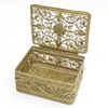 Golden Filigree Box. This elegant box was made entirely by hand, and not by a machine. It is a fine example of design and craftsmanship that was perfected in the days of Empress Catherine the Great (1762-1796). The pattern is reminiscent of bobbin-lace, and the artisans who created this style named it "Dew Drop" (in Russian, "Росинка"). It is hand decorated with tiny round pellets called "seed pearls" ("семенные жемчужины") and capped with a hand made rosette on the lid. Made the village of Kazakovo, near Nihzny Novgorod, a center of fine filigree work for decades. The box comes in it's original, Soviet-style box. 3"x2"x1¼".