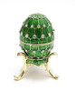 Mini Royal Green Enamel Egg. The style of Peter Carl Faberge is invoked by this elegant hand enameled egg box. The enamel is baked onto a pewter base, then polished and set with genuine Austrian crystals. The egg is hinged and opens to store small jewelry. Comes with its own matching color stand. Housed in a satin-lined gift box. 2¼" by 1¼".