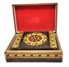 Set of 5 nested wooden Polish boxes. Crafted in Zakopane (Podhale region), a town which lies at the foothills of the Tatra Mountains. Each box is identically carved and stained with decorations incised using the techniques of the craft of traditional pyrography (woodburning). Boxes are lined with bright red felt (a nice touch), and nest perfectly within one another. The center of each box is a spiral flower with red and green enhancements and the surrounding wood is intricately textured. Three largest boxes have elaborate edge borders. An unusual set in brand new condition.