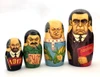 Yeltsin with Leaders (Ельцин с Вождями). The whole line of succession, from Yeltsin down to the beginning of the monarchy, is depicted in this 10 piece set. Larger dolls with more than 5 pieces are less common due to the cost of production.  A solemn Boris Yeltsin, the first post-Communist leader, heads off the caravan. A banner proclaims "Россия" (Russia) in red letter and the white, blue and red flag is painted on the back. Gorbachev in his characteristic blue suit has a yellow sash with the word Перестройка (Perestroika). His birthmark has the letters CCCP added. More leaders follow: 10 in all!
