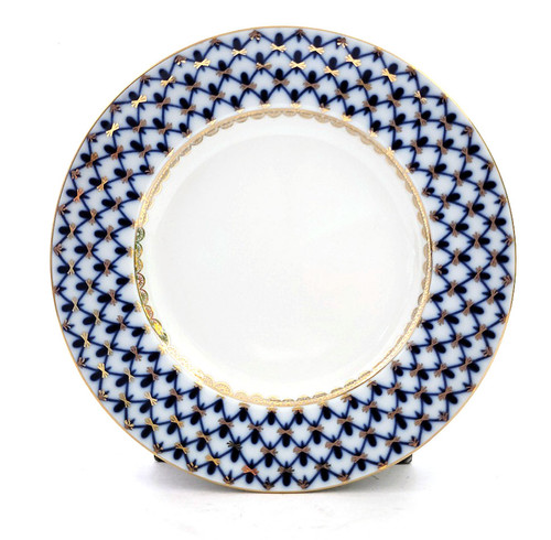 Cobalt Net Salad Plate. An elegant hors-d'oeuvre (zakuski) salad plate with a flat edge. Cobalt Net is the classic Russian decorative pattern and this plate is the genuine article! Fully hand painted and decorated at the Lomonosov Porcelain Factory in St. Petersburg, Russia. Brand new. Mineral cobalt, 22Kt gold. 7" diameter.