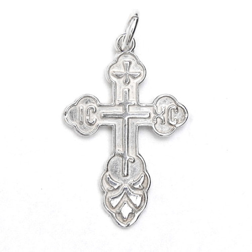 St. Olga Sterling Silver Russian Orthodox Cross. Traditional high-relief design. The initials for Jesus Christ, IC XC, and a descending dove, symbolizing the Holy Spirit. With the short prayer on the back: "Спаси и Сохрани" (Save and Protect). 1" (25mm) Sterling silver, cast by hand in small batches using the lost wax method. Elegantly gift boxed. St. Olga Sterling Silver Russian Orthodox Cross. Traditional high-relief design. The initials for Jesus Christ, IC XC, and a descending dove, symbolizing the Holy Spirit. With the short prayer on the back: "Спаси и Сохрани" (Save and Protect). 1" (25mm) Sterling silver, cast by hand in small batches using the lost wax method. Elegantly gift boxed.