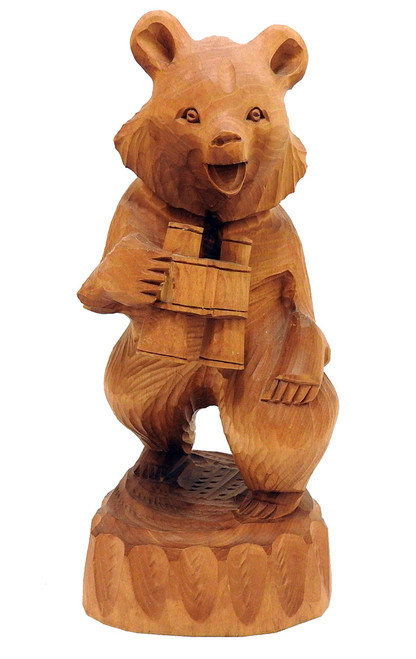 Misha Bear, Commander of the Forest (Миша Медведь, Хозяин Леса). Misha, the endearing moniker for a Russian bear, stalks about his domain with his trusty binoculars, while bird watching at the same time. Striking carving from Bogorodsk, circa 1990. 11" in height.