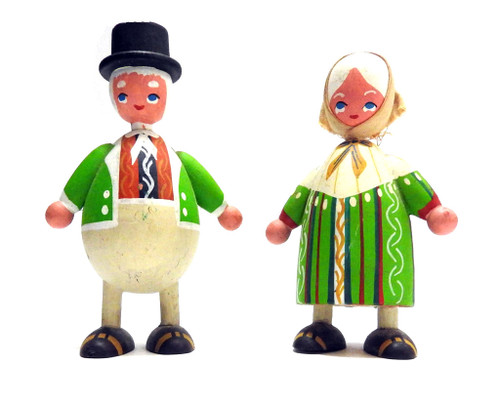 Vintage Scandinavian Folk Art Couple. Hand made, painted and assembled at Mogens Eigenbrod in Bogense, Denmark. Probably 1960s or '70s. This couple has been together for a long while, judging by their white hair. And yet, their expressions are youthful. Woman is about 4½" in height, he's a bit taller.