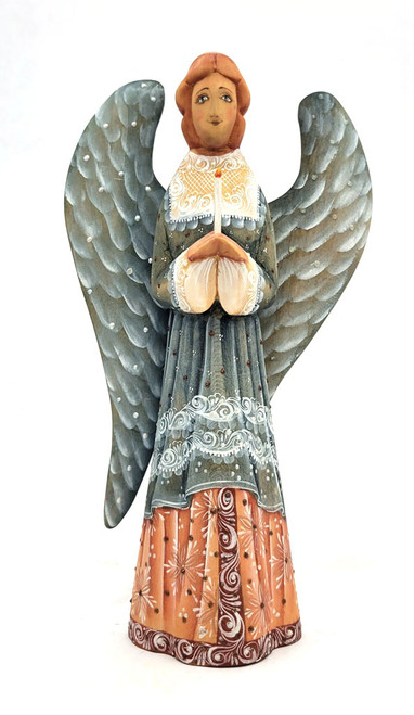 Tall Angel with Candle Carving (Ангел со свечой). A finely carved and fully painted angel holds a lighted candle. Angels are symbols of innocence, purity, devotion, hope, faith, and love. The candle she holds is a symbol of the light of life. Candles are lit in church as a prayer for peace or as a request for healing.  Made in Sergiev Posad, Russia about 10 years ago. 9" in height.