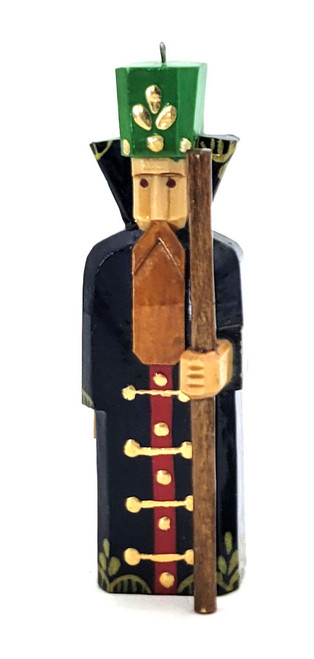 Medieval Boyarin (Средневековый Боярин). A fine fellow dressed in a blue over coat with fancy gold buttons. His tall hat, often trimmed with fur, indicates his social status. He holds a long staff in his left hand. Carved and hand painted with a high-gloss lacquer finish. Made in Sergiev-Posad, Russia, signed by the artist and dated 1993.