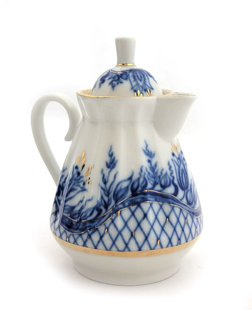 Blue Rhapsody Creamer with Lid. Use as a creamer or as a tiny pitcher for syrup, or other pourables. It shines with delicate beauty and Old World elegance.  Blue Rhapsody was one of the names of this classic pattern, now discontinued. The pattern was was created by legendary Russian designer, Nina Pavlovna Slavina (1928-2000), who named it Лучистая Нежность, which translates as Radiant Tenderness. Garden is another name attached to this pattern. A delicate lid with a grip. Cobalt blue and 22 Kt gold tendrils and a basket weave. 1990s red Lomonosov Porcelain backstamp, 4⅝" in height.
