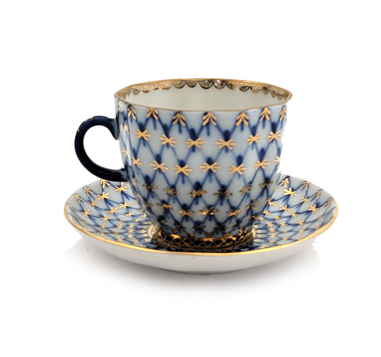Cobalt Net Coffee Cup and Saucer. Cobalt net is the trademark style of the Lomonosov Porcelain Factory, which first appeared in 1949. The pattern is a combination of hand painted intersecting lines, or netting, of cobalt blue with inverted tear drops of cobalt blue (made from mineral cobalt) and 22 karat gold accents. Cup is 2½" high and 2¾" diameter. Saucer is 4½" diameter. Red ЛВЗ (LFZ) backstamp and "Made in USSR" in English, indicating pre-1991 manufacture.