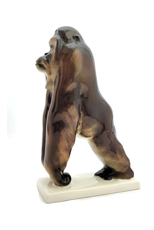 Orangutan (Орангутанг). Orangutans are intelligent great apes that can be found most of the time in the rainforests of Borneo and Sumatra. They have proportionally long arms and short legs and their hair is reddish-brown. This piece is 7½" x 5" and was hand painted at the Lomonosov Porcelain Factory and marked with the factory backstamp. Two talented artists collaborated to produce many of the "Porcelain Zoo" animal sculptures. Porcelain painter Viktor Zhbanov and sculptor/modeler Pavel Veselov. The fruit of their cooperation produced unique figures that are natural and distinctive in their poses.