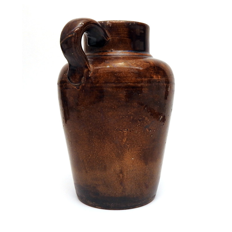 Rustic glazed terracotta water or oil jug. Also known as a cruche. Used to keep water fresh or store oil. France, 19th century.