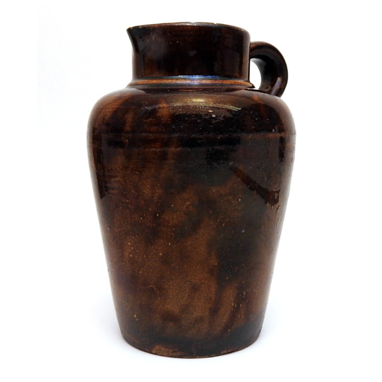 Rustic glazed terracotta water or oil jug. Also known as a cruche. Used to keep water fresh or store oil. France, 19th century.