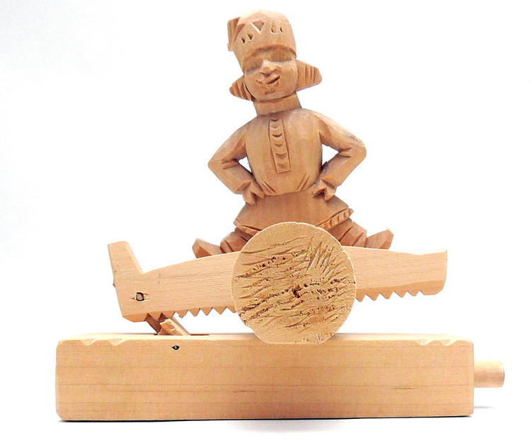 Ivan and the Magic Saw (Иван и Волшебная Пила). Ivan sits astride a log and magically directs the saw to cut it in half. Push button action. Late 1980s.
