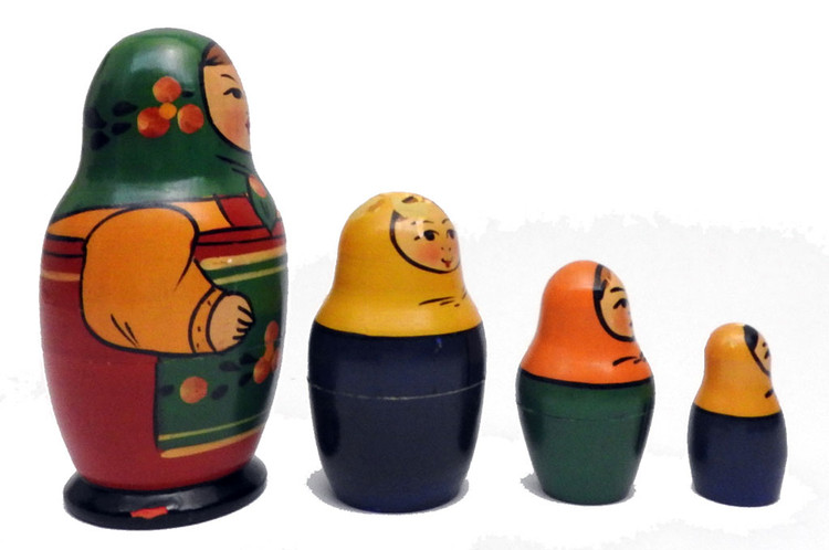 Zagorsk Matryoshka (Загорская Матрешка). Vintage 4-nest from early 1970s. Strong primary colors common in dolls from this period. In good condition with usual flaking and chipping that plagues Zagorks dolls. No retouching has been done. Purple backstamp with enough legible to indicate Zagorsk Factory No. 1.