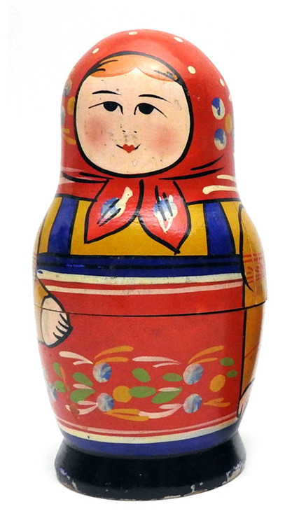 Zagorsk Matryoshka []1960s]. This is an early matryoshka doll and probably was made in the early to mid-1960s. The colors are still vibrant and the condition is fair (see below). One prominent feature of Russian nesting dolls in particular, and Russian applied art, in general, is that folk art made 75-100 years ago (as this doll was) appears as if it were made in even earlier times. This is due to the conditions and skills of production which changed little from the late 19th century up the the 1960s and 1970s. Dolls from before the start of the "tourist" era in the USSR - roughly early 1960s - are scarce.