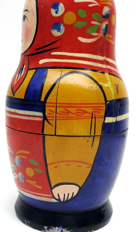 Zagorsk Matryoshka []1960s]. This is an early matryoshka doll and probably was made in the early to mid-1960s. The colors are still vibrant and the condition is fair (see below). One prominent feature of Russian nesting dolls in particular, and Russian applied art, in general, is that folk art made 75-100 years ago (as this doll was) appears as if it were made in even earlier times. This is due to the conditions and skills of production which changed little from the late 19th century up the the 1960s and 1970s. Dolls from before the start of the "tourist" era in the USSR - roughly early 1960s - are scarce.