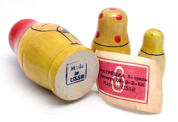Vintage Mini Matryoshka. This doll with a neat paper label is an early version of our classic Viatka 3 nest. The main difference is the expression of the girl on the first piece, which speaks volumes to the political system of the time. Made in the Kirov Factory in the 1970s.
